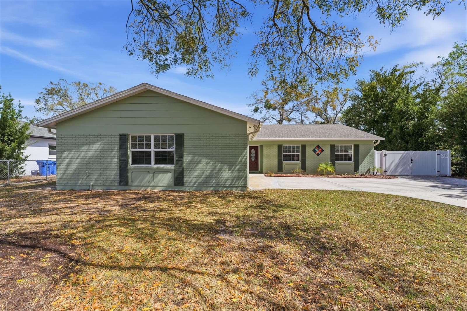 Carrollwood · 4 bed / 2 bath · 11,205 sq ft lot, no HOA photo 2